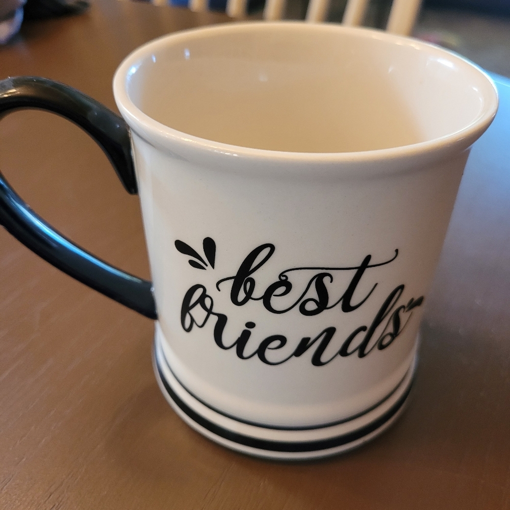 Black and White Ceramic Mug with Decorative Script